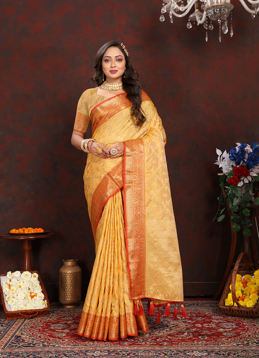 Gold Soft Katan Silk Saree with rich zari woven design and matching blouse