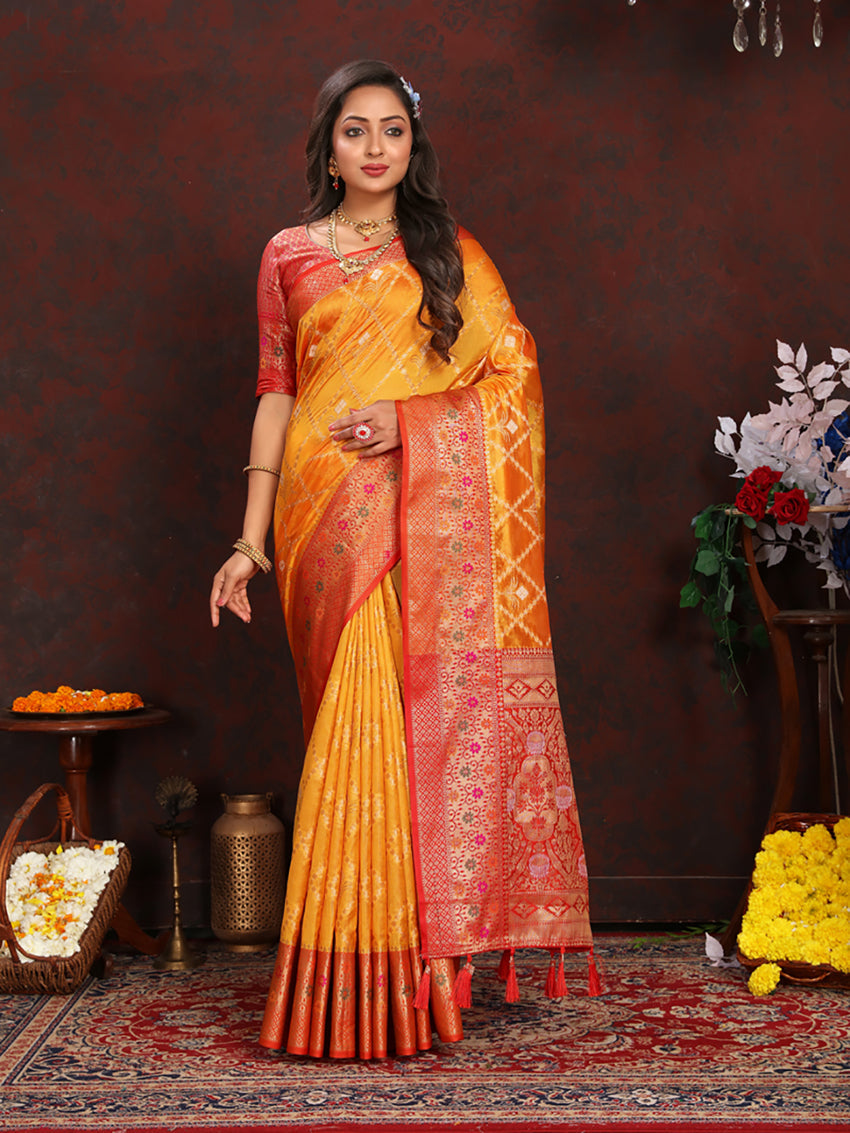Gold organza silk saree with elegant Meenakari woven pallu