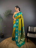 Green Banarasi soft silk saree with traditional butti work and unstitched blouse