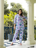 Woman wearing a fashionable Manya multi-colored digital print muslin cotton co-ord set