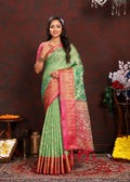 Green Organza Silk saree with rich Meenakari woven pallu and matching silk blouse