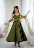 Front view of a green Romansilk Chanderi Anarkali kurta with lace work on the yoke and matching pants and dupatta.