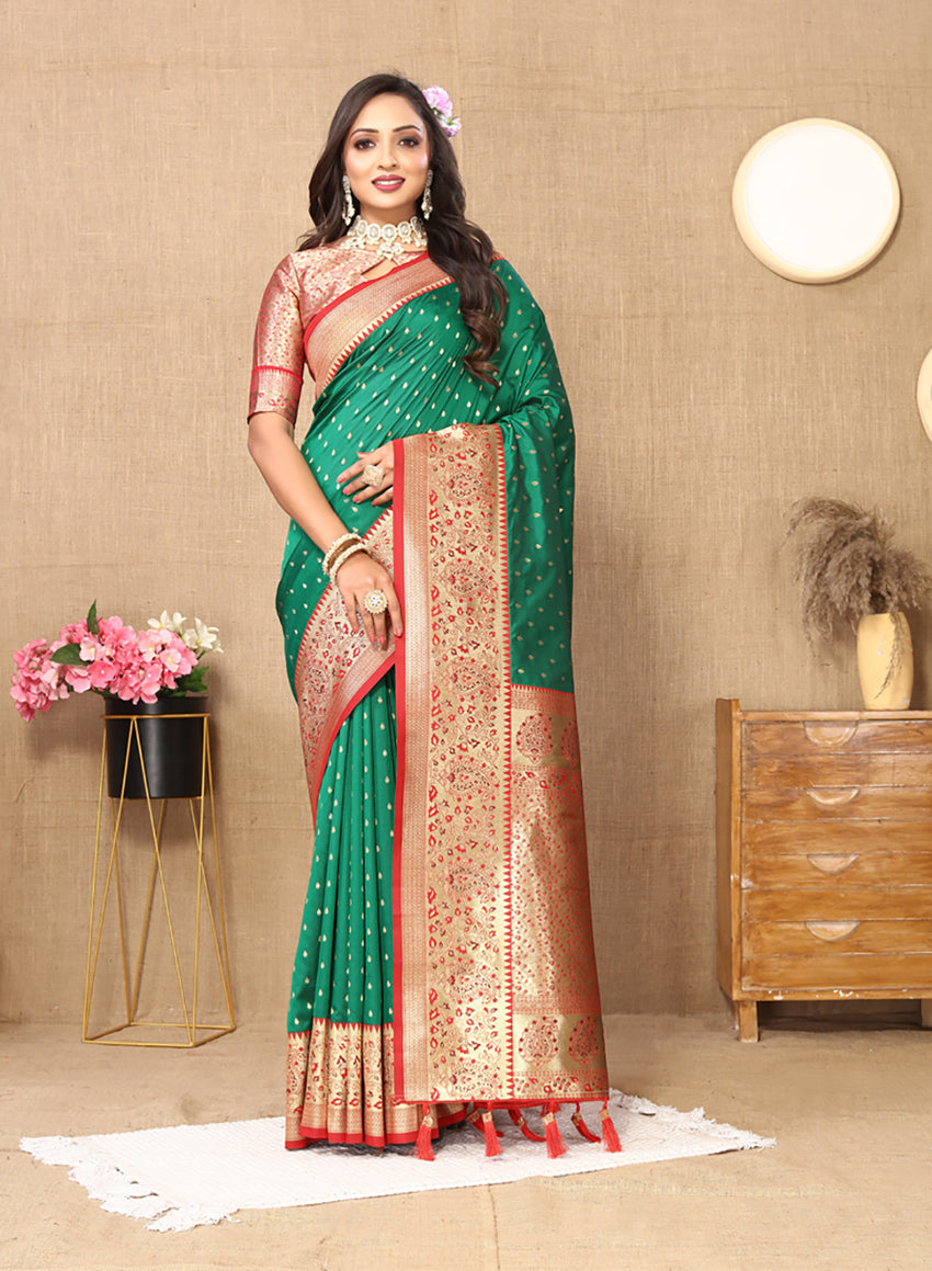 Green soft silk saree featuring intricate gold Zari weaving patterns.