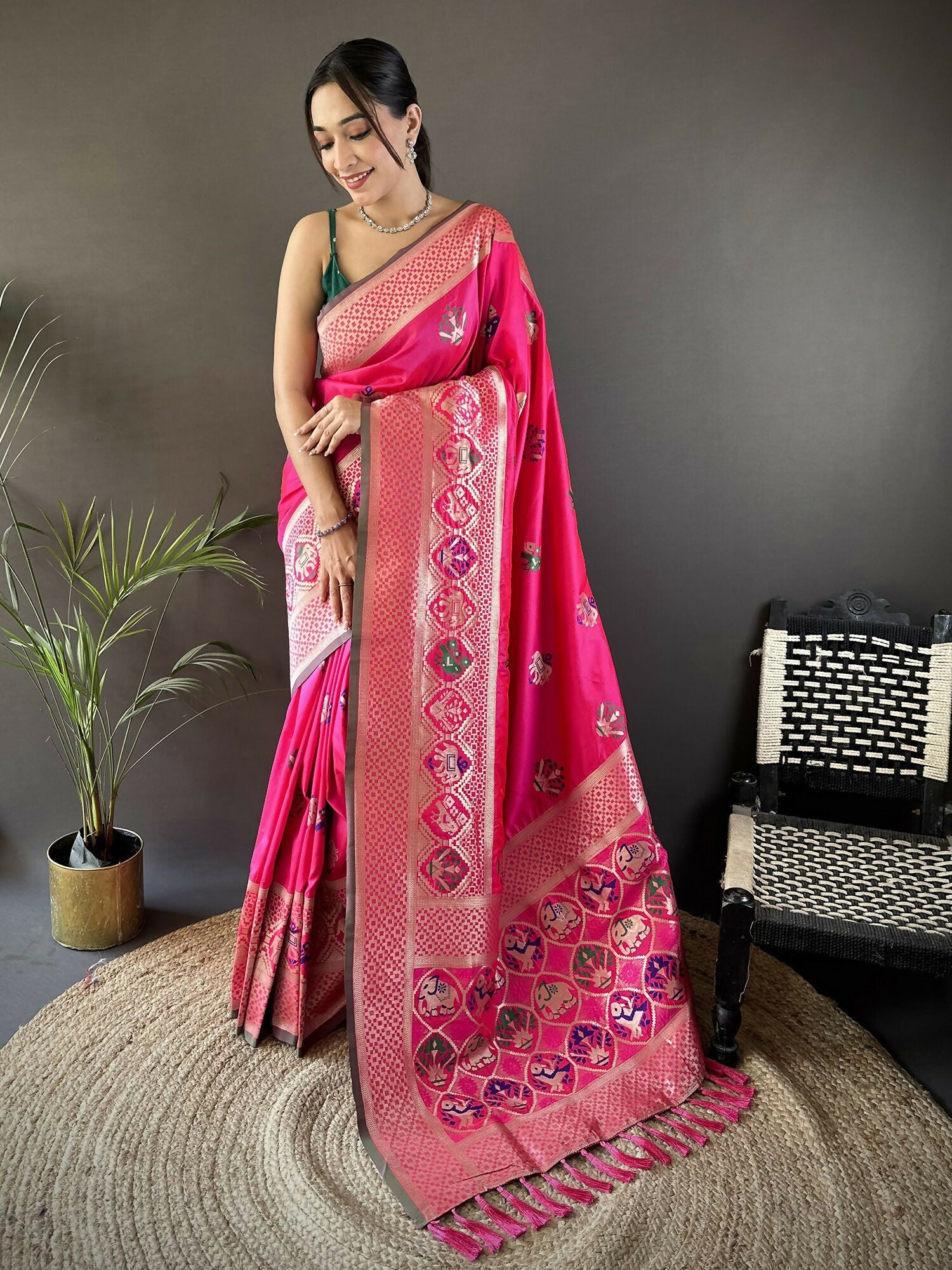 Rani Pink Banarasi Saree with elephant and floral woven motifs