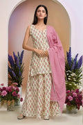 Cream printed cotton lehenga set featuring a pink top and white printed bottom