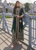 Green Pakistani designer salwar suit with detailed embroidery and full sleeves