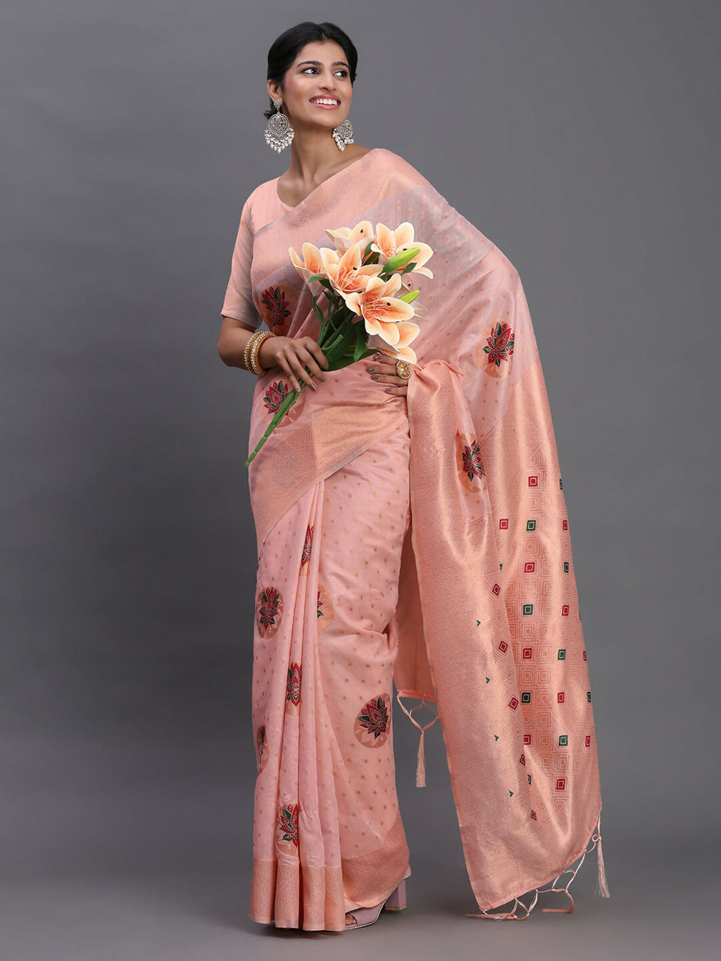 Comfortable light pink linen cotton saree with matching blouse, perfect for versatile styling.