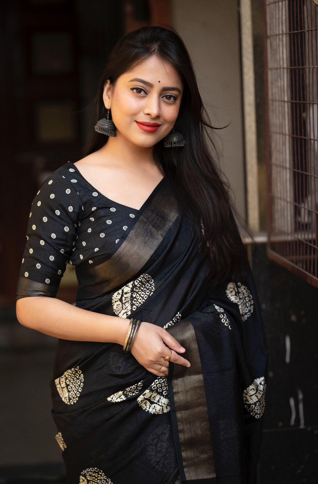 Black Cotton Crepe Saree with Traditional Batik Print and Zari Border