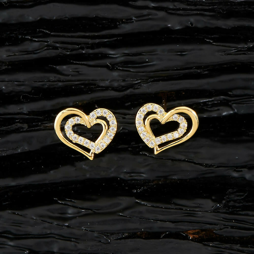 A stunning pair of Golden White AD stone earrings on a neutral background.