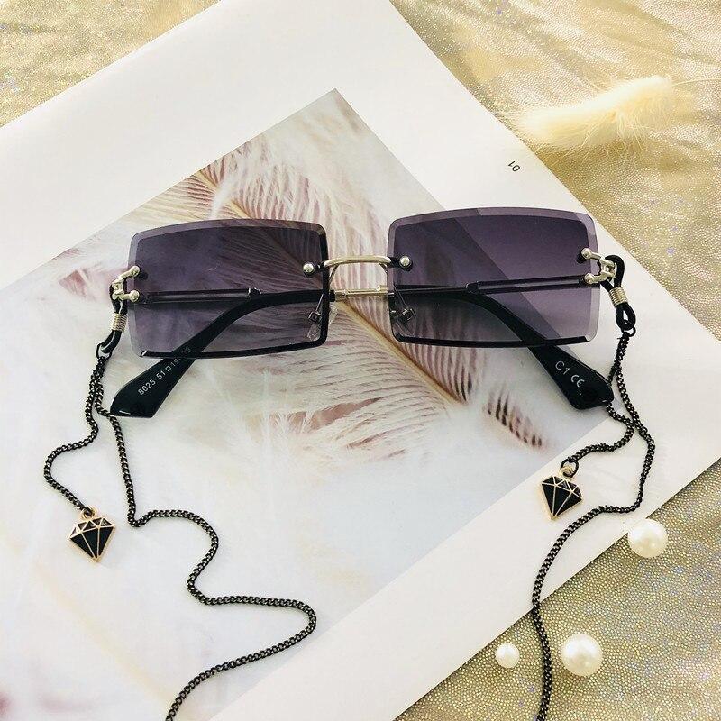 Trendy women's small rectangle rimless sunglasses with metal frame