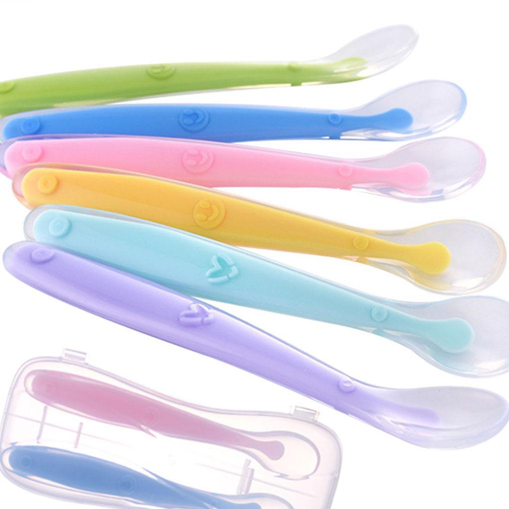 Pastel silicone baby feeding spoon with temperature-sensing design for modern nurseries