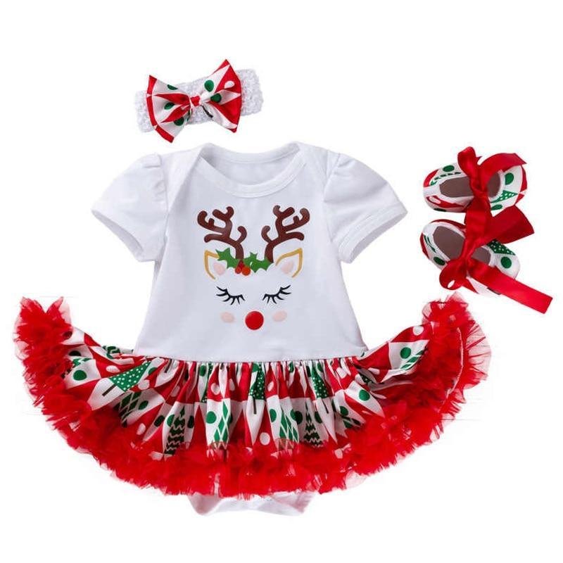 Festive 3-piece baby girl outfit featuring a cartoon deer print dress, headband, and shoes in white, red, and green.