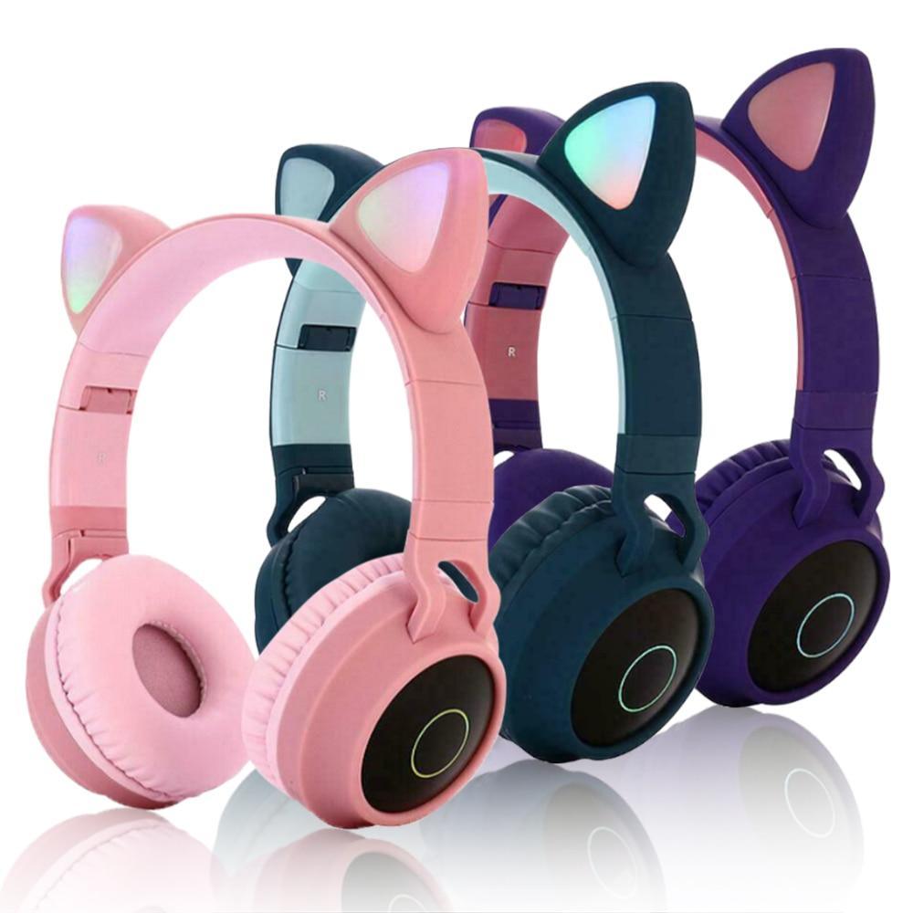 Pink foldable wireless Bluetooth headphones for kids with integrated microphone