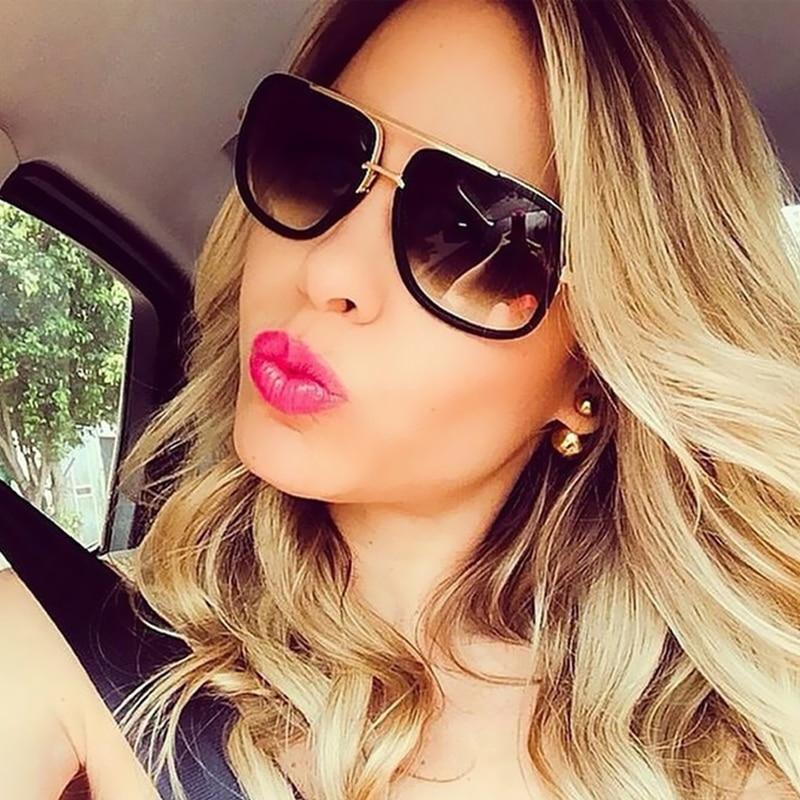 Unisex oversized square retro sunglasses with metallic gold frames and polarized lenses.