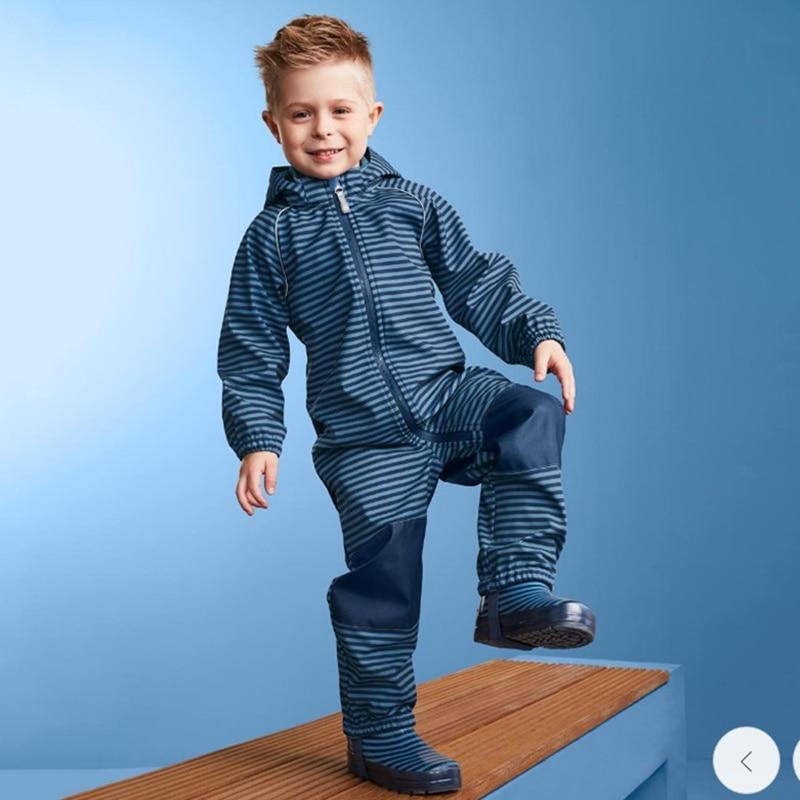 Child wearing a colorful, waterproof fleece-lined soft shell ski suit with a front zipper