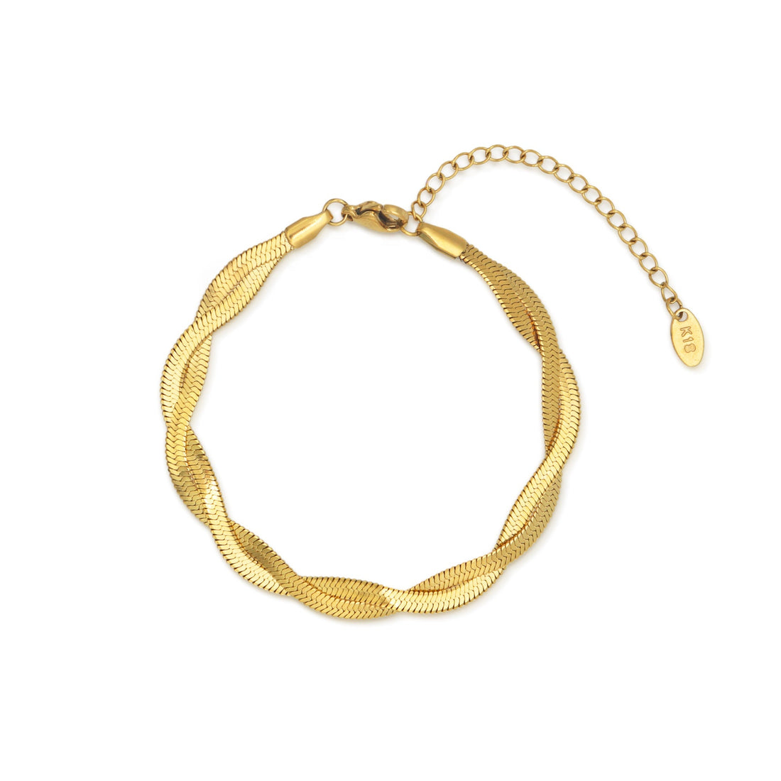 A close-up of the Ygraine Larue Gold Herringbone Twisted Chain Bracelet on a white background, showcasing its unique twisted design and lobster clasp. A second image shows the bracelet elegantly worn on a wrist.