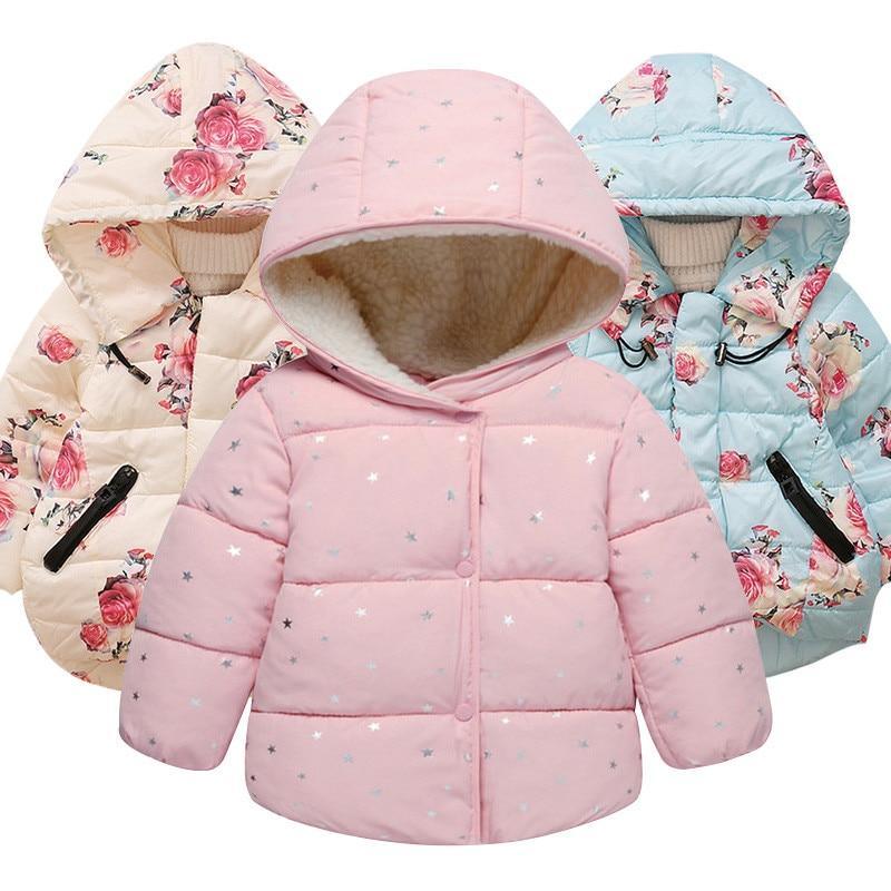 Baby girl wearing a cute floral print hooded winter jacket in pink