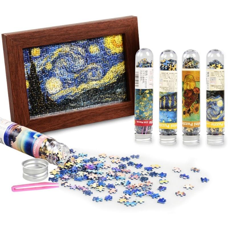 234-piece vibrant abstract art miniature puzzle in clear test tube packaging on a desk