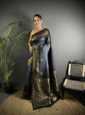 Grey handloom silk saree featuring traditional Ikkat weaving patterns