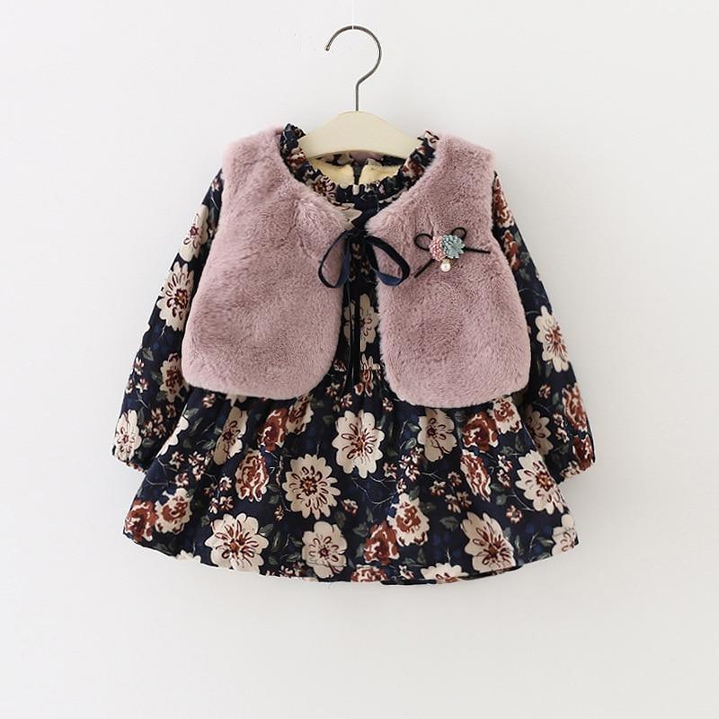 Baby girls 2-piece set featuring a navy floral knit dress and a soft pink faux fur-trimmed coat.
