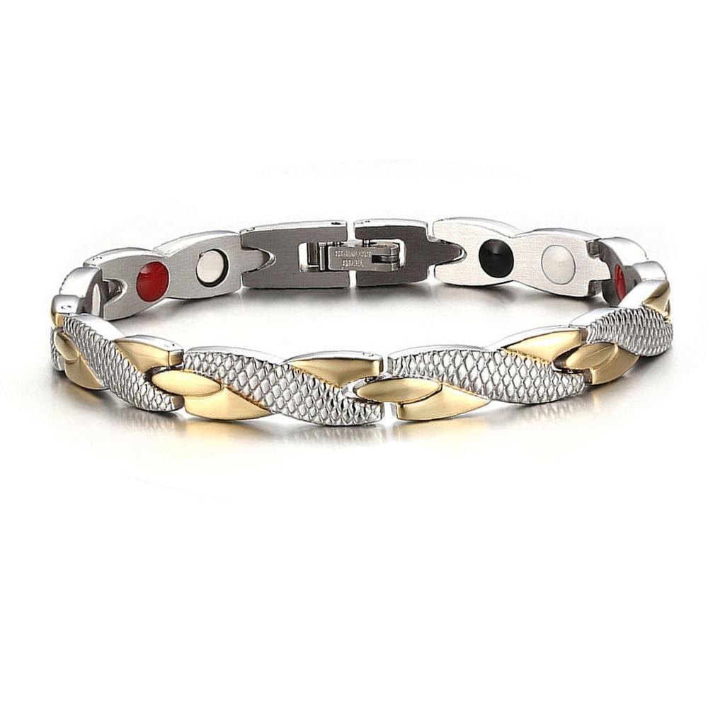 Modern twisted magnetic bracelet in gold and silver finish on a clean background