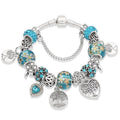Silver Tree of Life Charm Bracelet with Green Crystals
