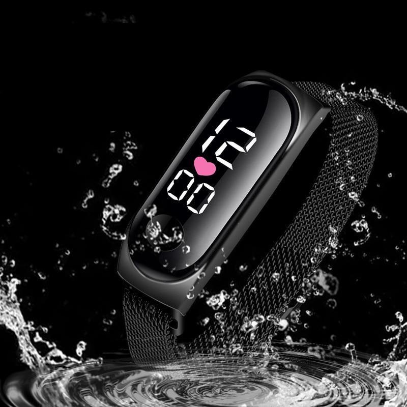 Minimalist unisex digital watch with a metallic finish and folding clasp