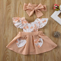 Baby girl floral print sundress featuring ruffles and a large decorative bow