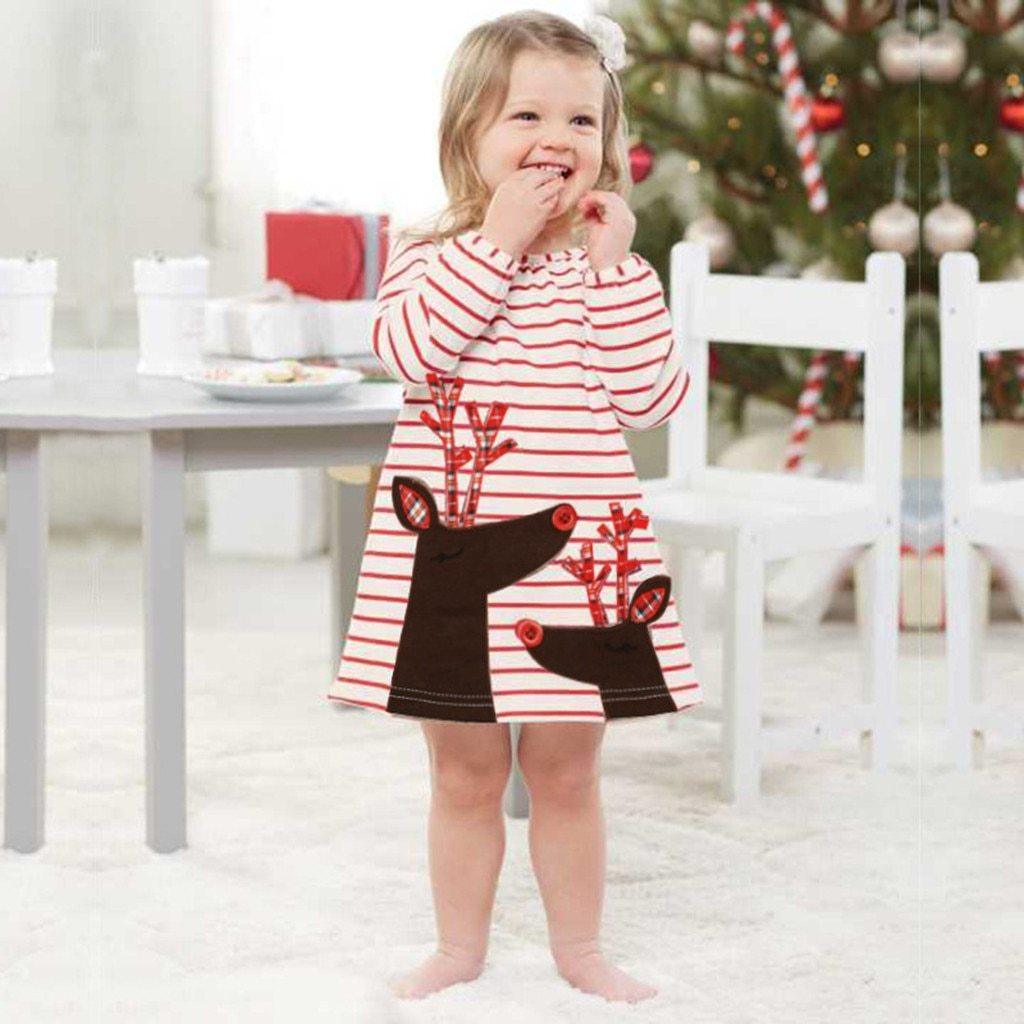 Toddler girl wearing a festive striped Christmas princess dress with a cartoon deer design