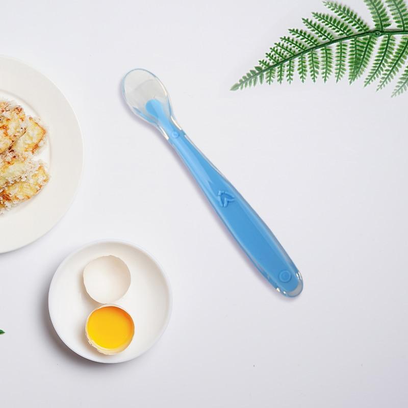 Pastel blue, green, and purple silicone baby spoons for safe feeding