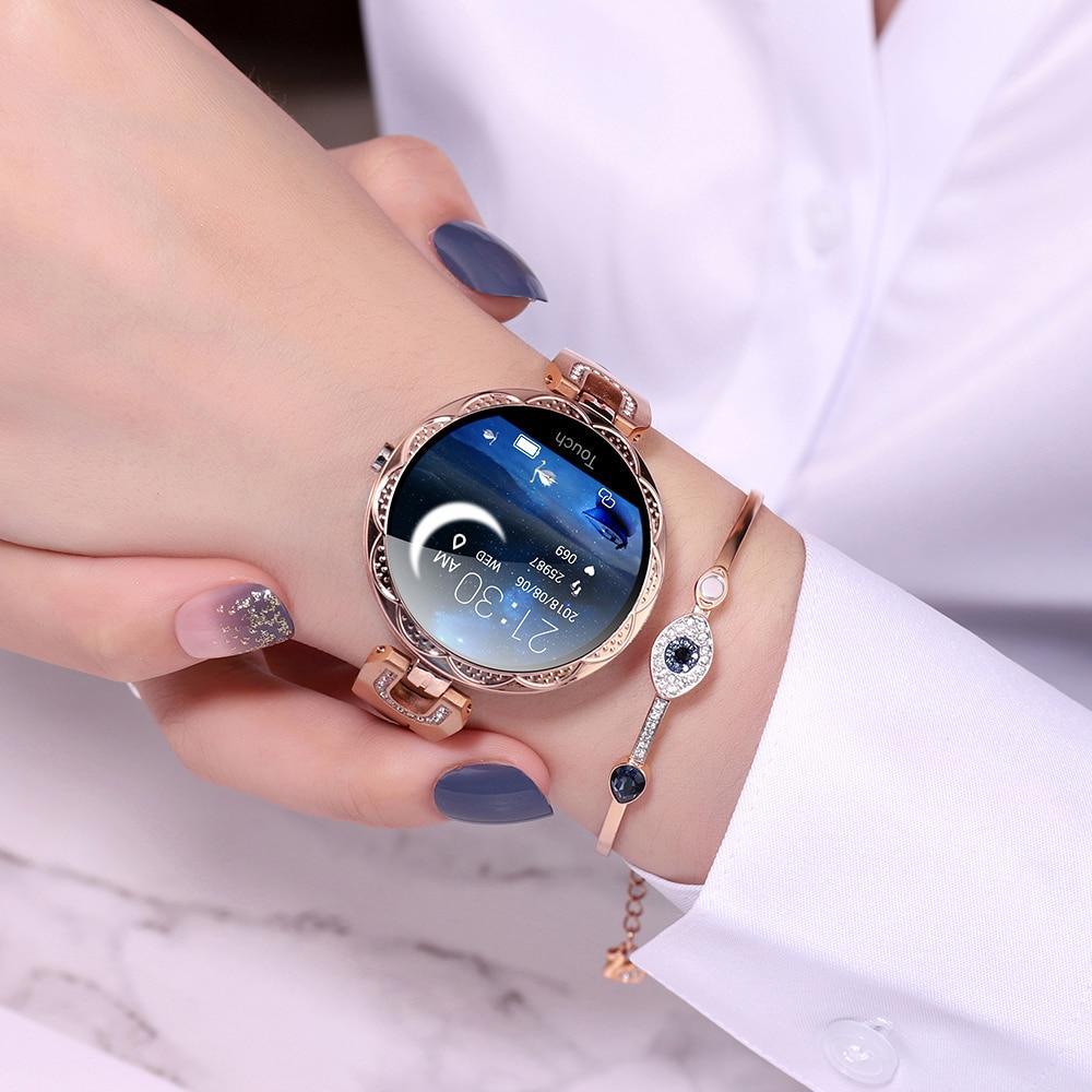 Rose-gold women's smart watch with a round display
