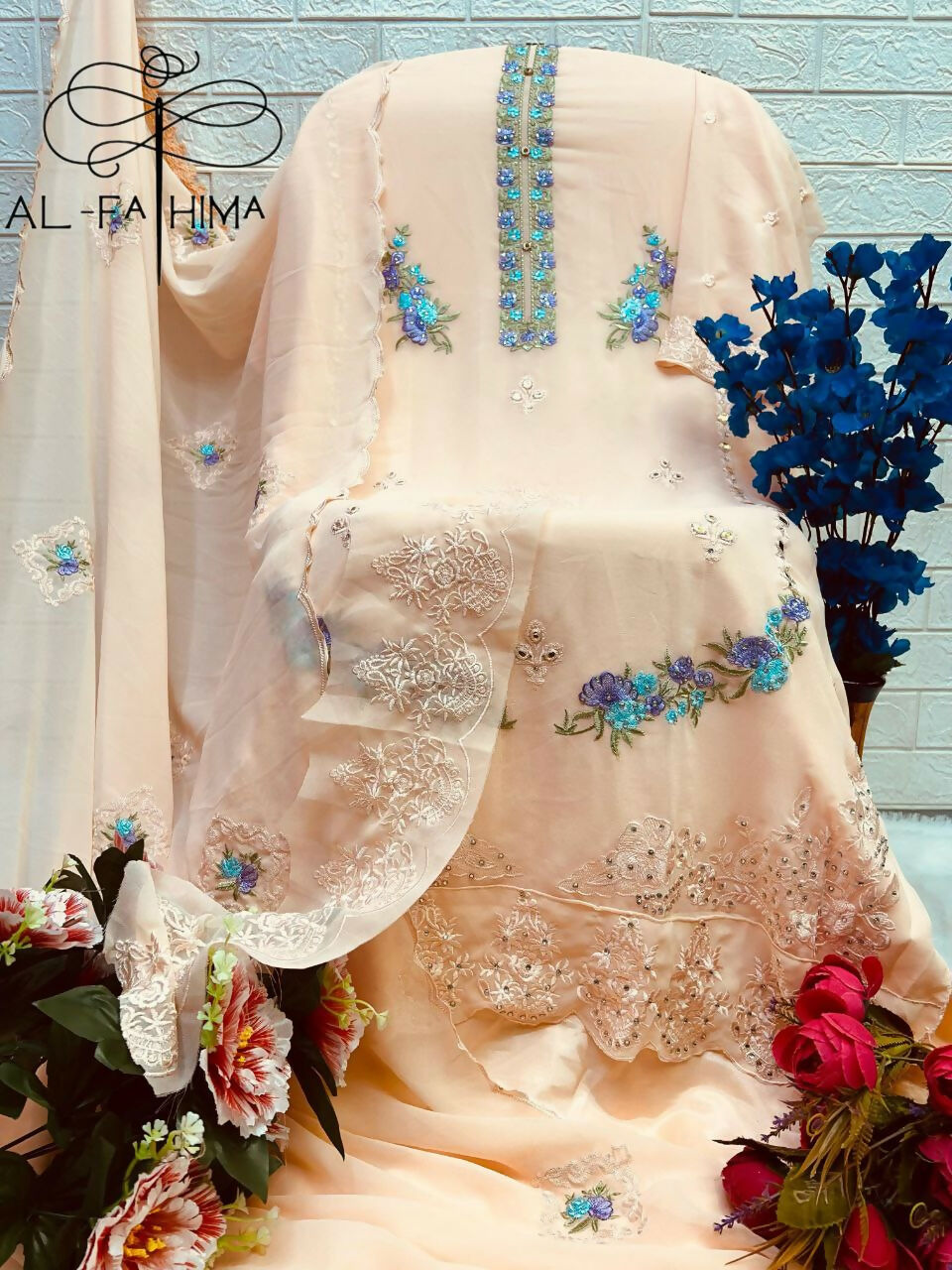 Peach Faux Georgette Kurta Set with Heavy Embroidery and Moti Work