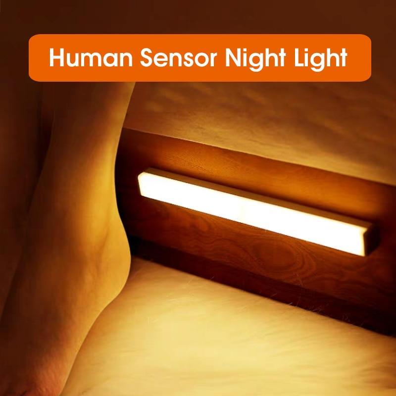 Slim silver motion sensor LED light mounted inside a kitchen cabinet