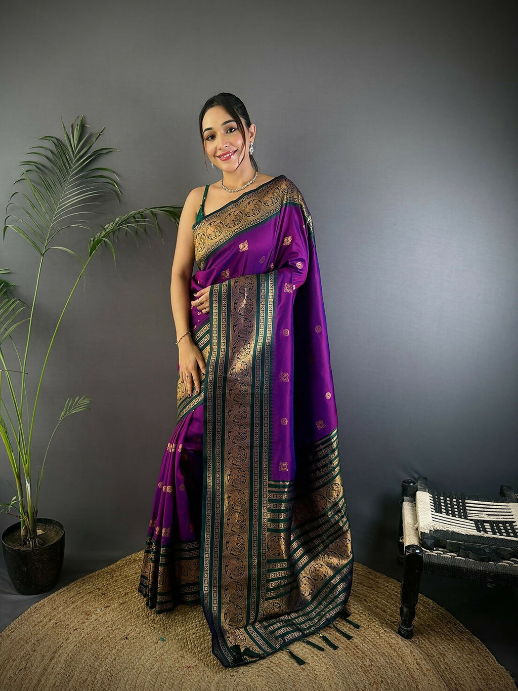 Magenta Banarasi soft silk saree with intricate woven details and matching blouse fabric.