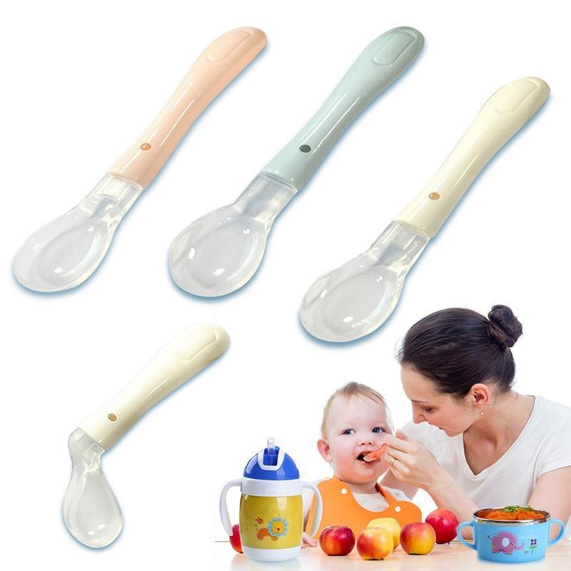 Temperature-sensing silicone baby spoon in a clean minimalist design for newborn feeding