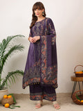 Woman wearing a purple silk-blend embroidered kurta with matching palazzo and printed dupatta