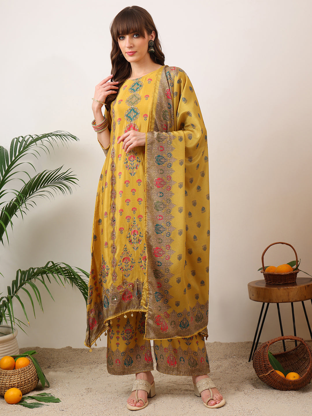 Mustard asymmetric kurta with printed palazzo and dupatta set