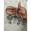 Silver-tone bangle with hanging jhumki charms and multicolor pearls