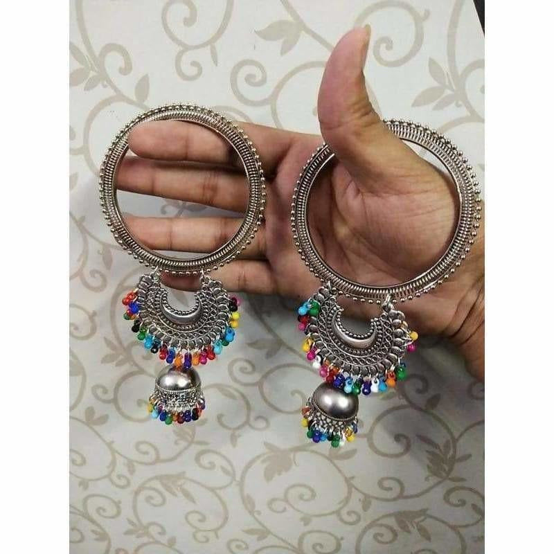 Silver-tone bangle with hanging jhumki charms and multicolor pearls