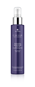 Bottle of Alterna Caviar Anti-Aging Replenishing Moisture Leave-In Conditioning Milk in purple and silver packaging.