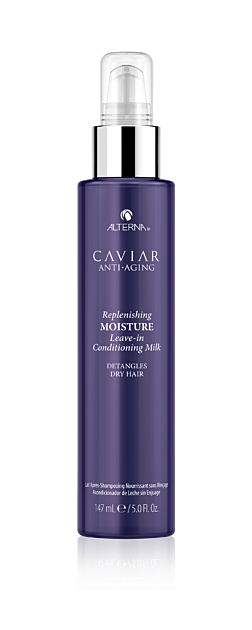 Bottle of Alterna Caviar Anti-Aging Replenishing Moisture Leave-In Conditioning Milk in purple and silver packaging.