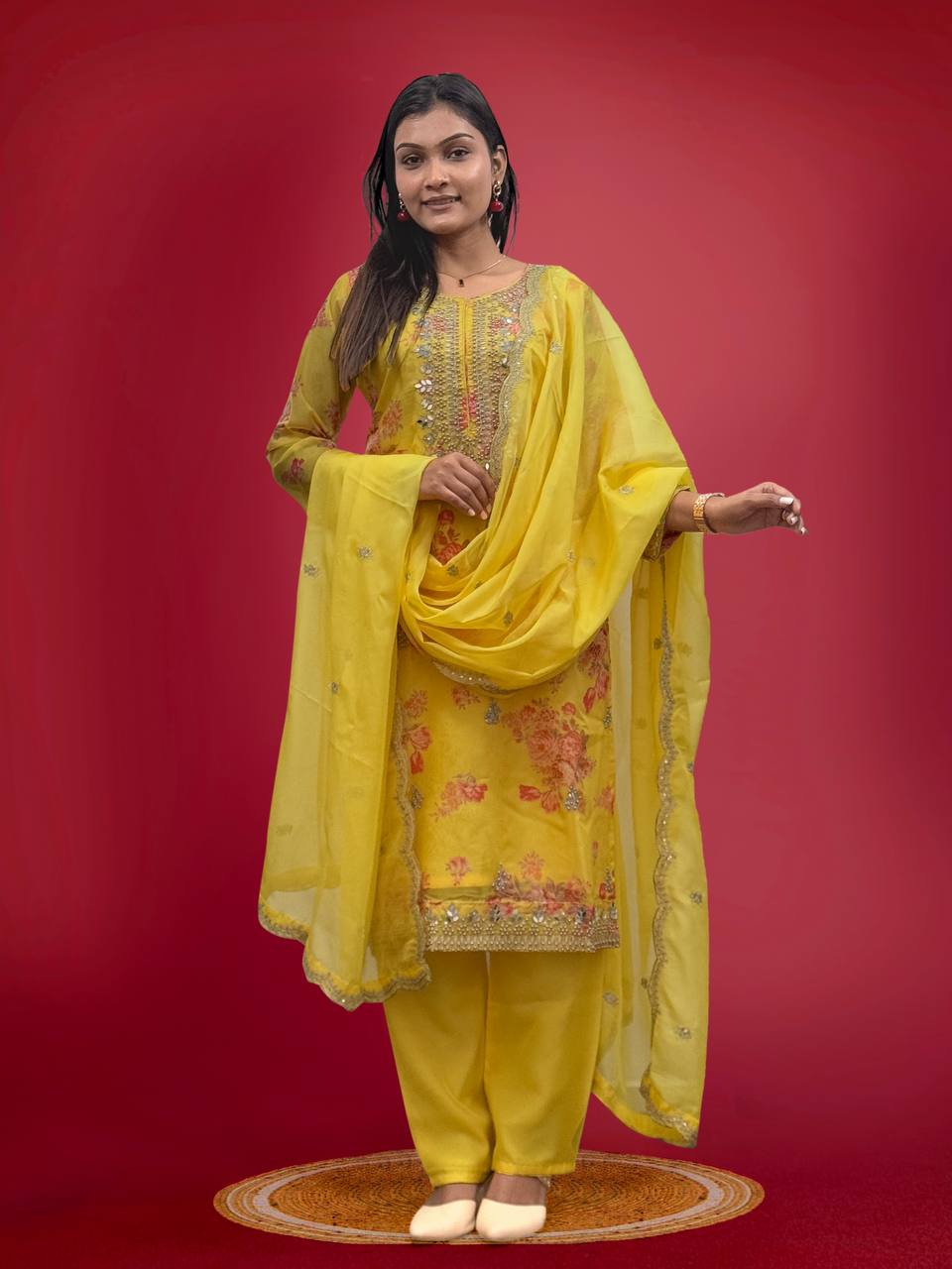 Yellow pure Kundan Organza salwar suit with heavy stone mirror work and embroidery