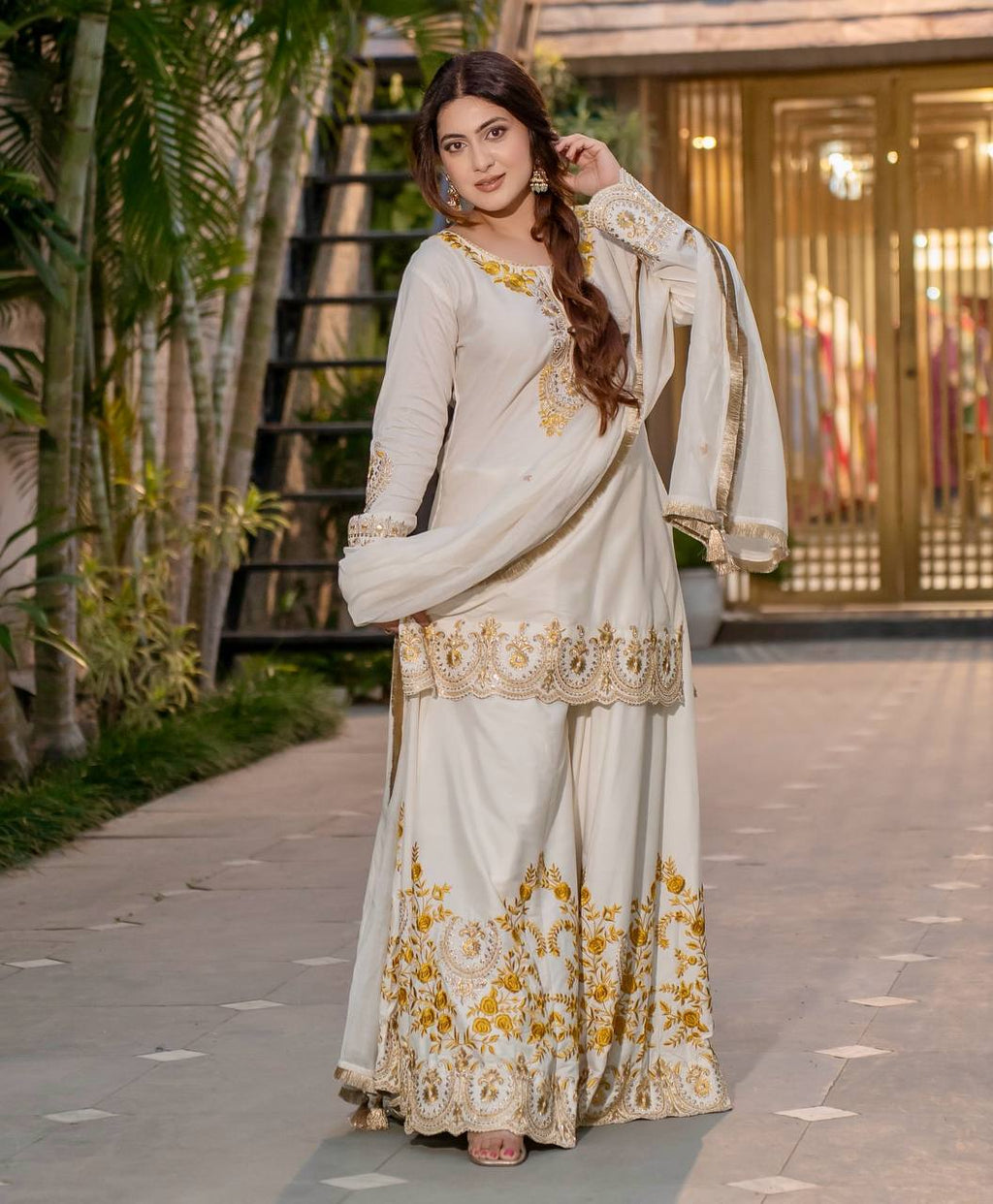 Elegant white palazzo suit with thread and sequin embroidery details