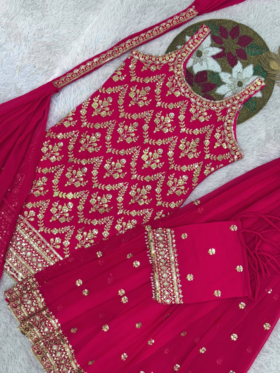 Pink heavy georgette palazzo suit with sequin work and embroidery