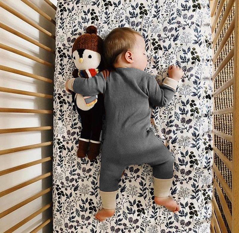 Retro Long Sleeve Baby Romper with Button Closure
