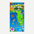 A colorful beach towel with a illustrated map of Florida showing major cities, tropical animals, and vacation icons.