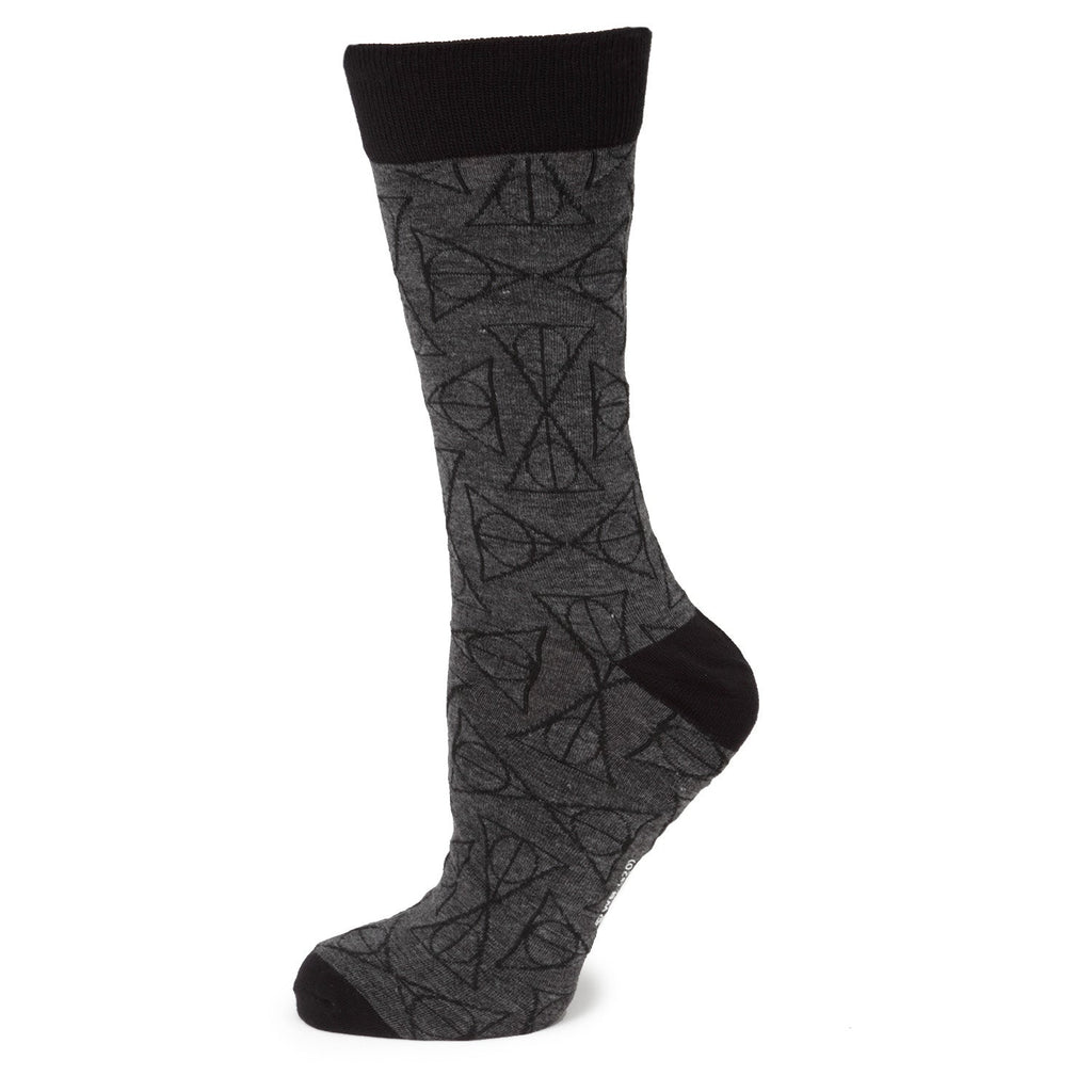 A pair of grey men's crew socks featuring an all-over black Harry Potter Deathly Hallows symbol print with black heels and toes.