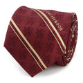 Close up of a maroon silk Harry Potter Gryffindor tie with gold stripes and lion pattern