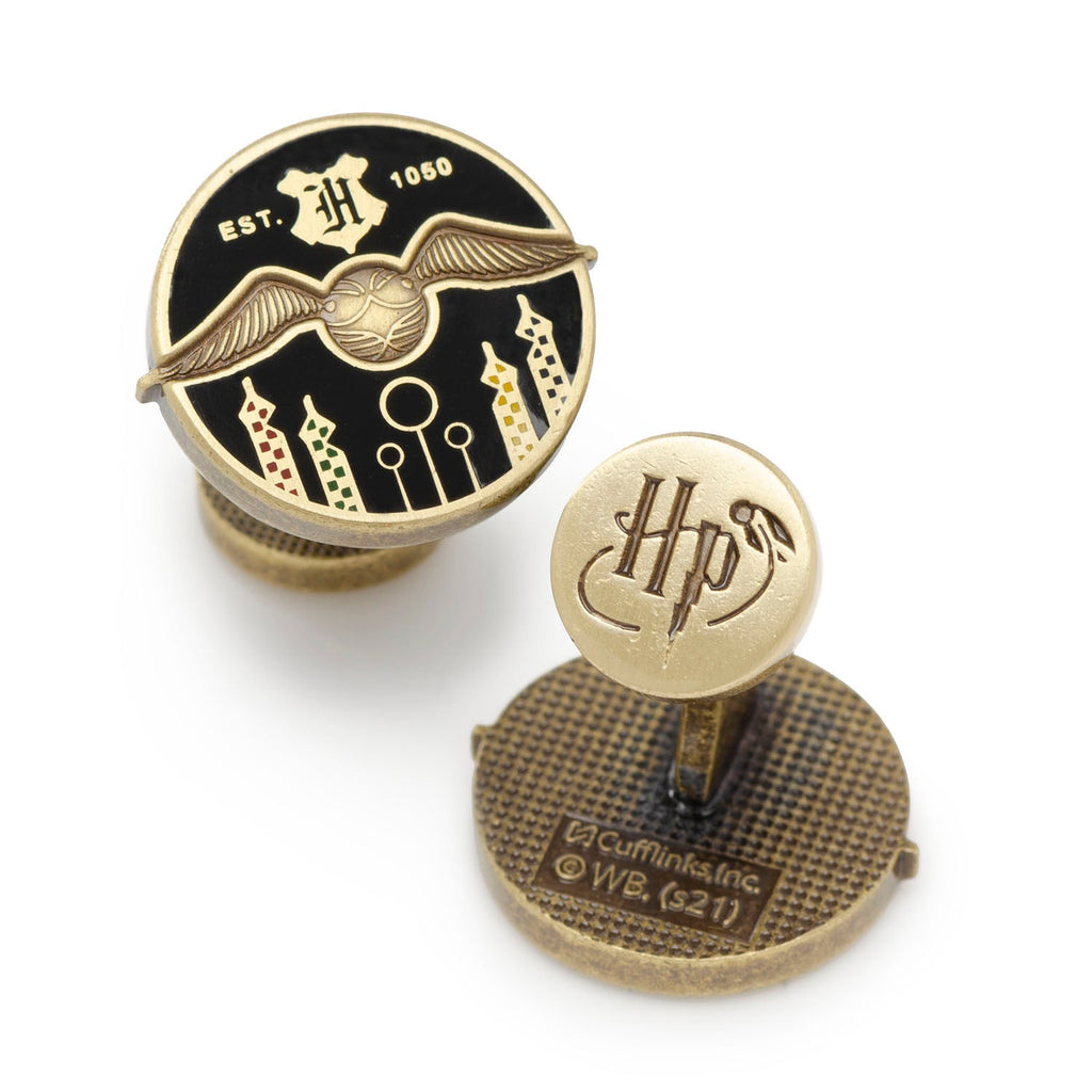 Round gold-tone Harry Potter Quidditch field cufflinks featuring a Golden Snitch and black enamel.