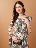 Model wearing a black cotton kurta set with embroidered and printed details, paired with a matching dupatta.